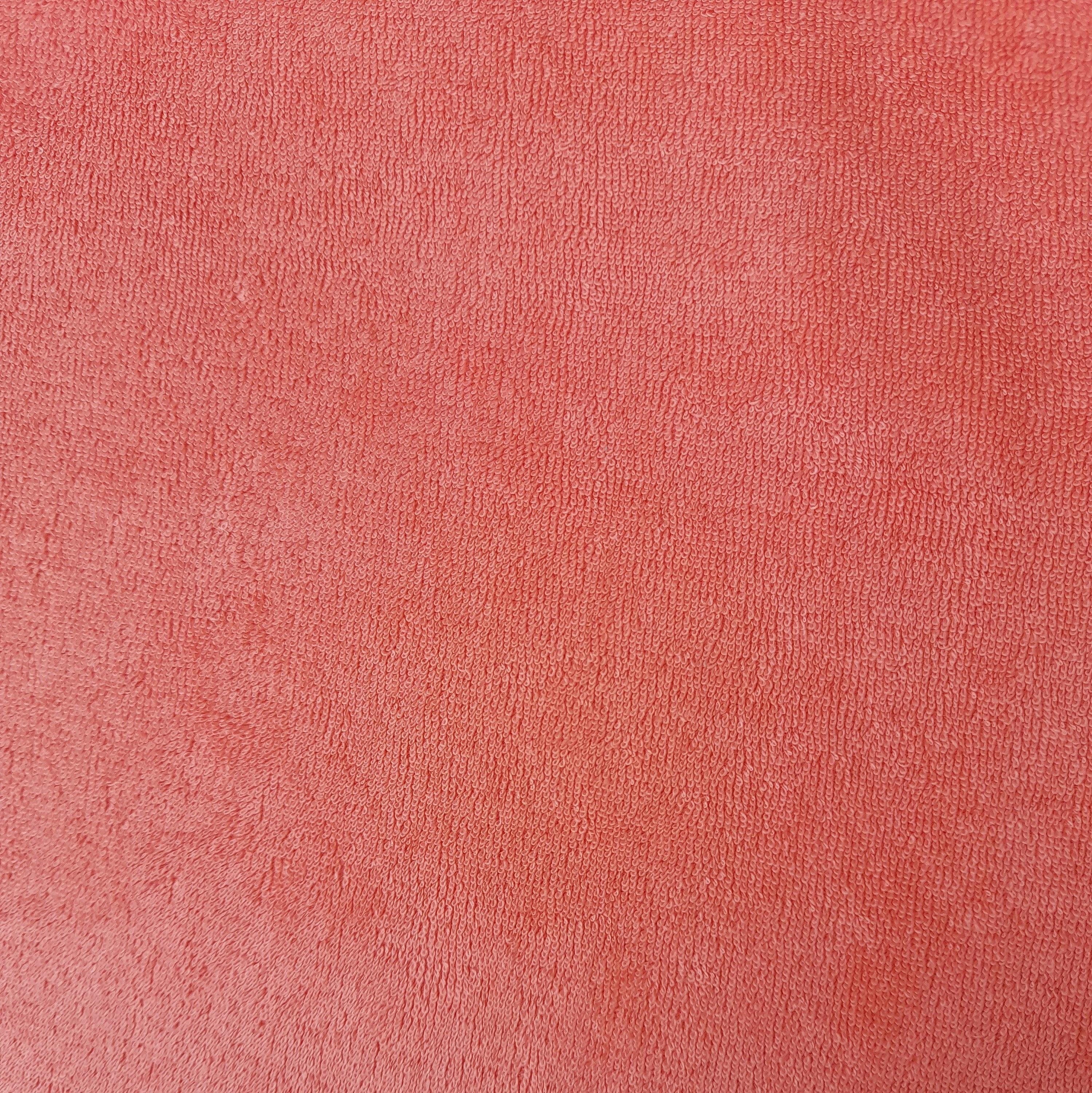 Texture de tissu éponge rose pour La Coussinière.